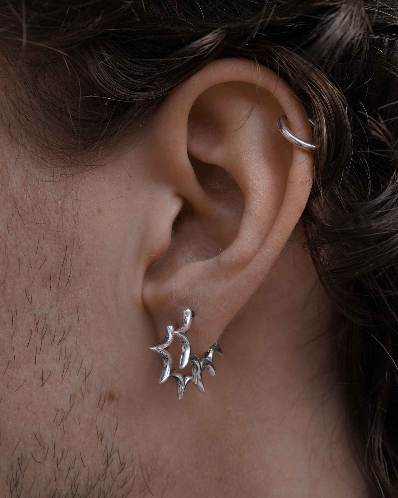 Burst huggie earring detail shot