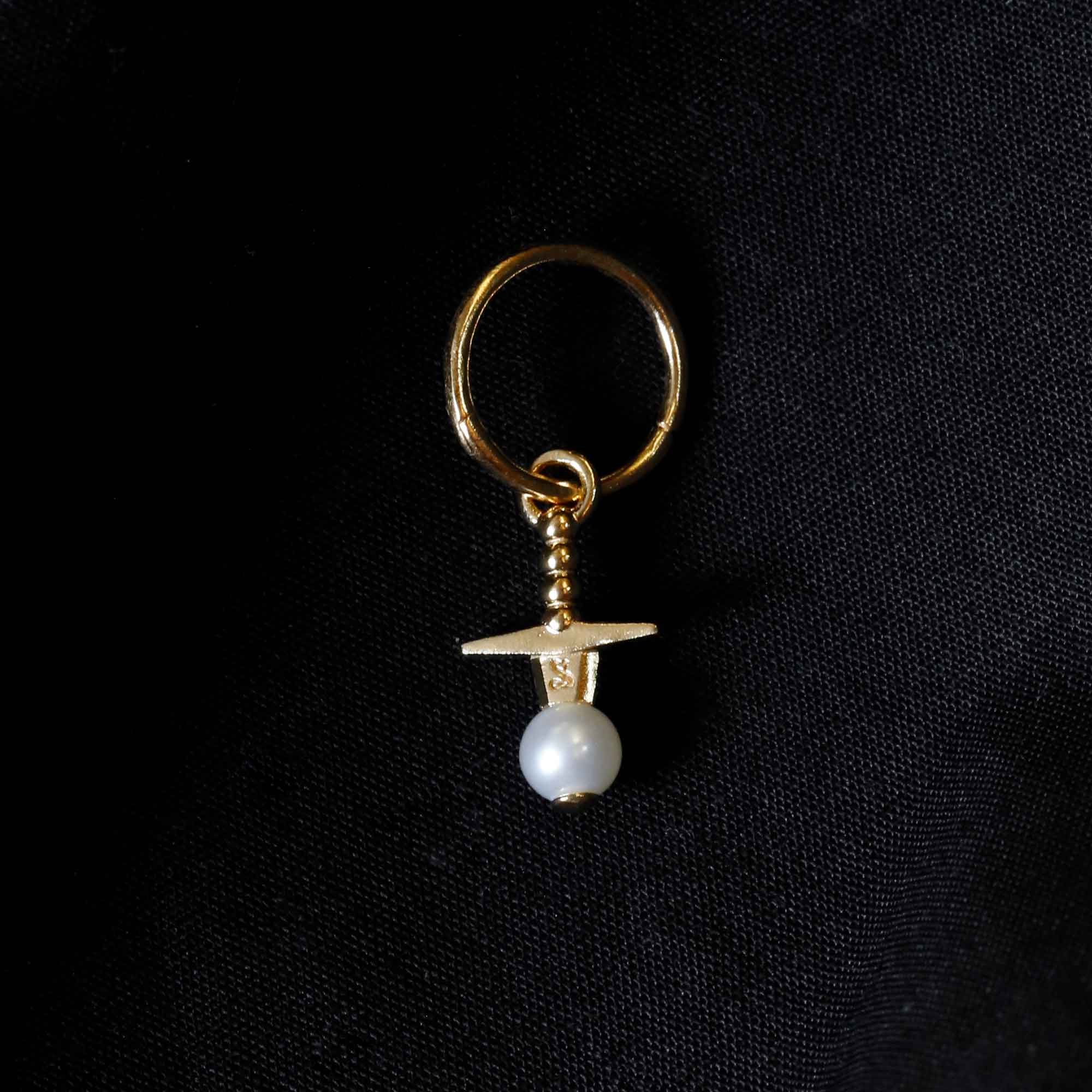 22CT gold vermeil sword earring though pearl stone