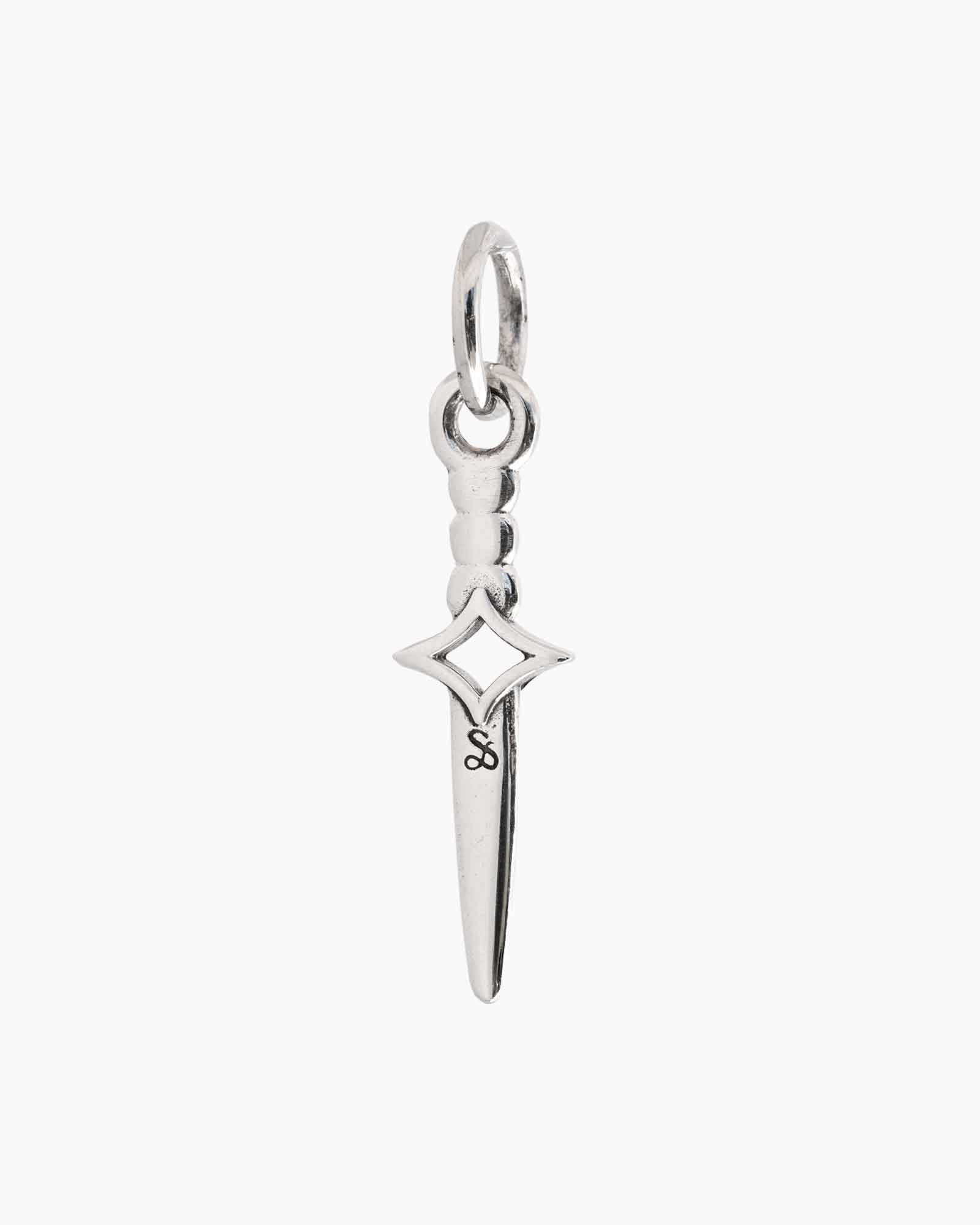 Silver dagger-shaped charm on a white background