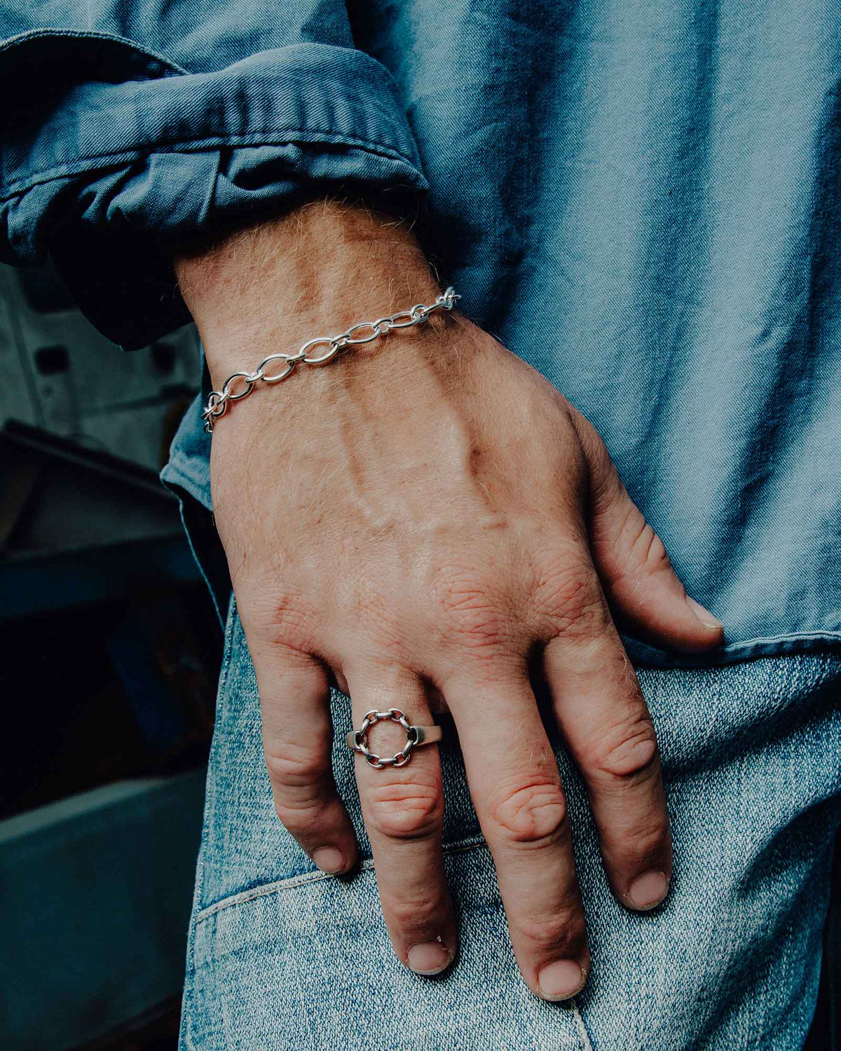 Close-up of the Chain Drive ring worn on the hand