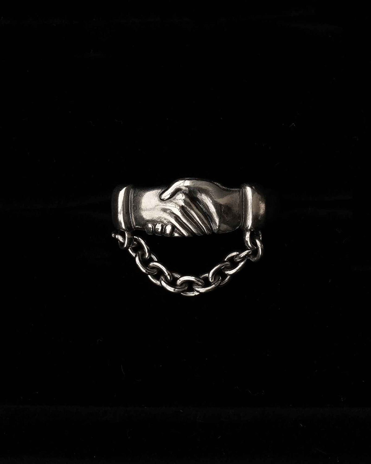 Silver handshake ring with chain cuff