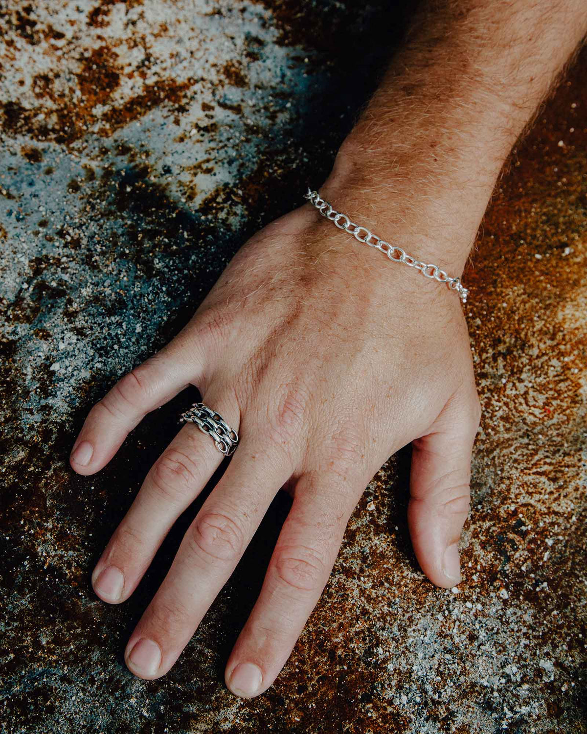 Close-up of the Chain Stack ring worn on the hand