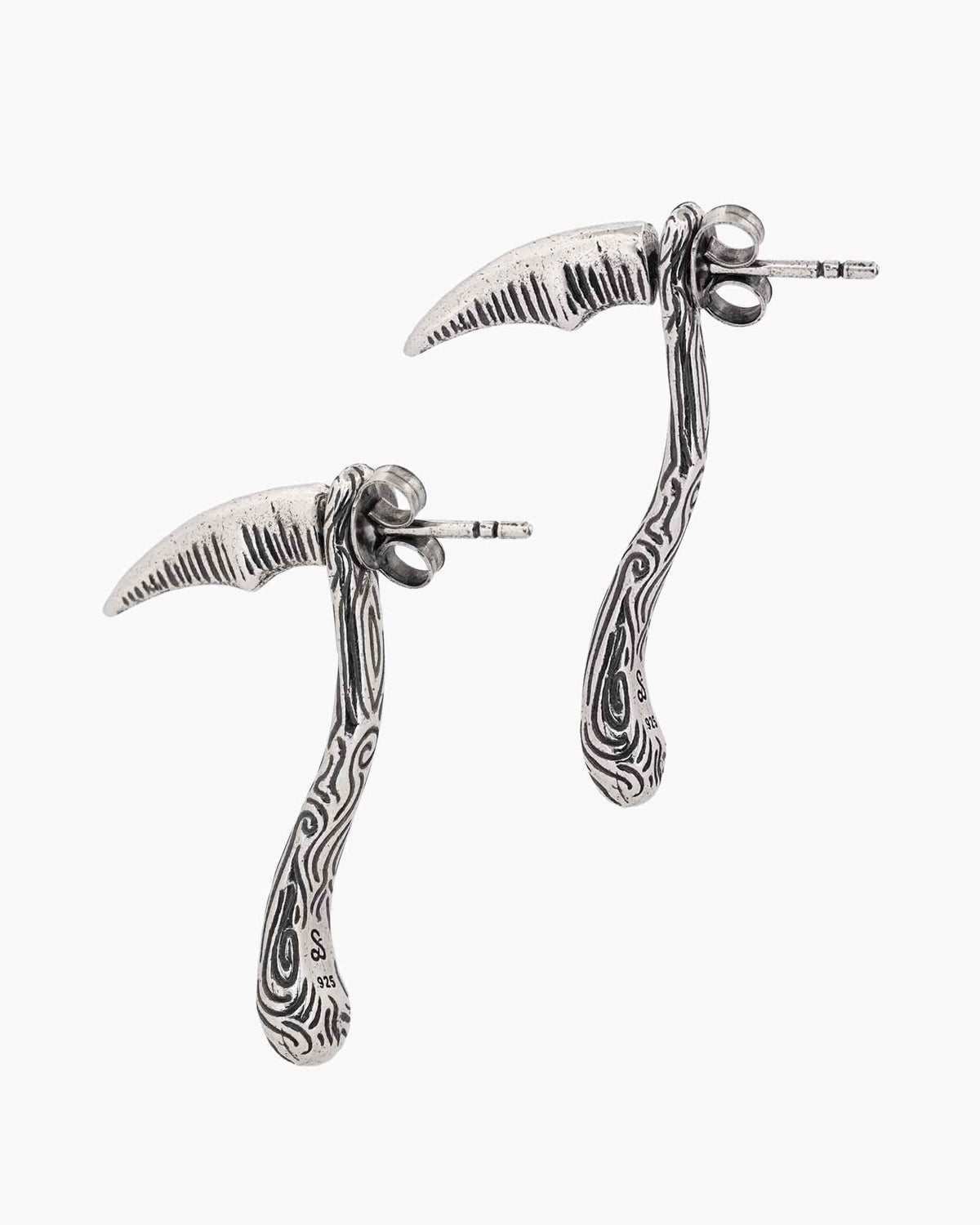 Pair of sterling silver Sickle earrings on a white background
