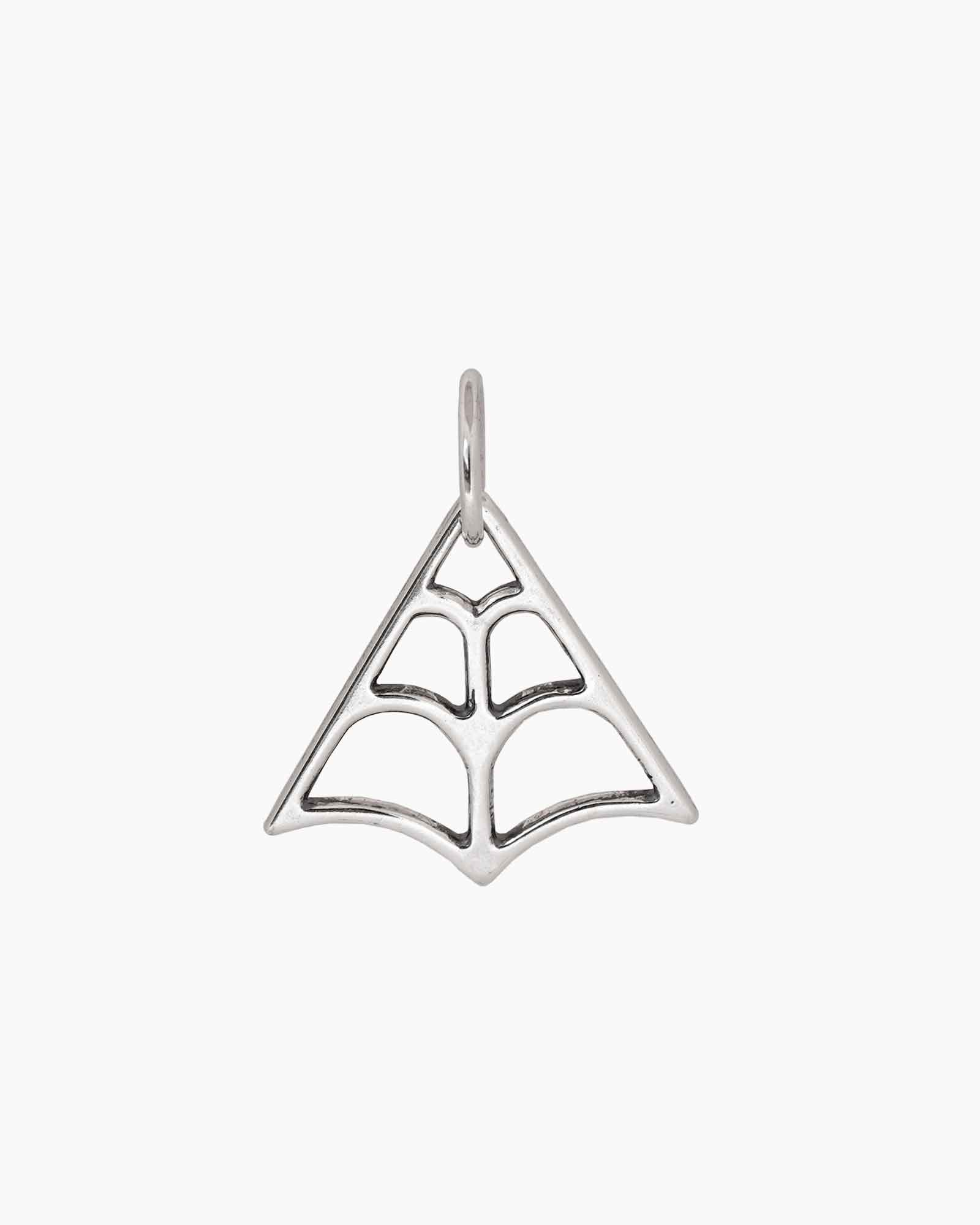 Silver spider web pendant on a white background